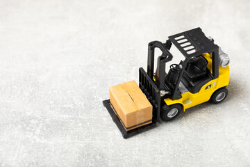 Yellow forklift and yellow truck on bright background. Logistics concept. Logistics and supply...