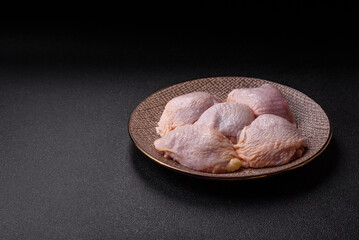 Chicken thigh raw, fresh poultry meat with salt and spices