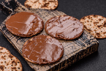 Matzah with chocolate paste for the Jewish holiday of passover