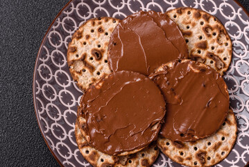 Matzah with chocolate paste for the Jewish holiday of passover