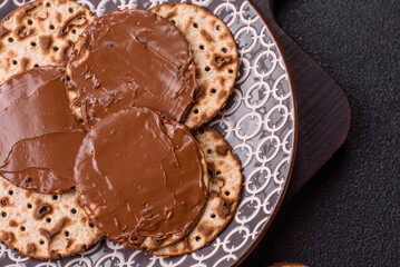 Matzah with chocolate paste for the Jewish holiday of passover