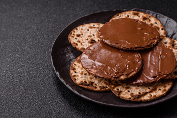 Matzah with chocolate paste for the Jewish holiday of passover