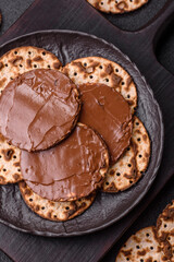 Matzah with chocolate paste for the Jewish holiday of passover