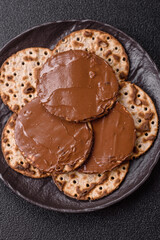 Matzah with chocolate paste for the Jewish holiday of passover