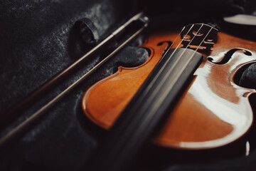 Fototapeta premium Violin with bow in a case
