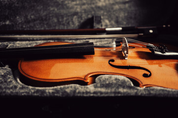 Violin with bow in a case