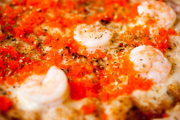 Closeup of Fresh shrimp pizza with your choice of cream cheese