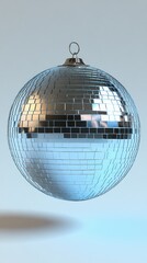 Fototapeta premium Reflective disco ball, comprised of tiny mirrors, hangs on soft blue gradient