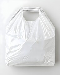A clear plastic shopping bag with a cut-out handle sits on a white background.  It's slightly crumpled, showing its texture