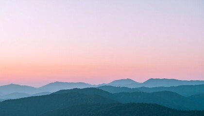 Serene Sunset Over Layered Mountains
