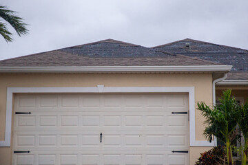 Shingles ripped off a roof © InversedSlayer