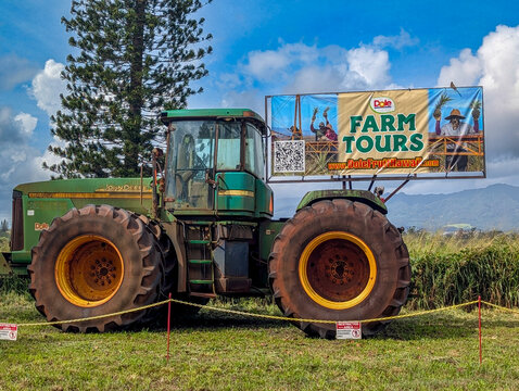 Wahiawa, Hawaii, USA - 4.24.2025: Dole Farm Tour advertisement on a tractor