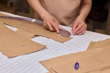 Tailoring Craftsmanship A Fashion Designer at Work Creating Beautiful Patterns with Precision
