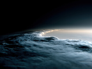 Light from space illuminating clouds over Earth at dawn, showcasing planet atmosphere and curvature with dark background