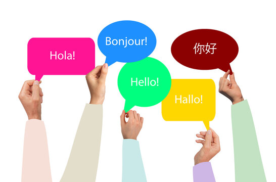 Hands group holding a multilingual speech bubble with Hello in various languages. Spanish, French,
