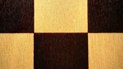 Fototapeta premium close-up wooden chessboard texture background with dark and light squares for print design, branding visuals, or web backgrounds high detail graphic