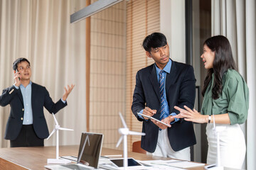 ESG sustainability collaboration among professionals in office