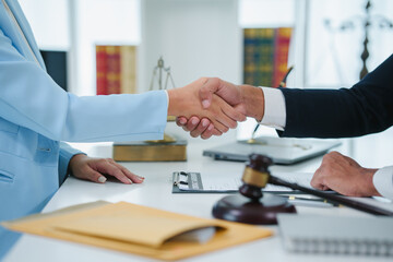 Business people, man and woman with handshake, lawyer and client with deal, contract and partnership. Office, interview or thank you with attorney, legal aid and shaking hand for promotion or welcome