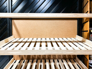 Bare shelves in grocery store. Symbol of economic collapse and supply chain failure. Reflects poverty, inflation, and scarcity in struggling nations. Topics of crisis, recession, and social issues.