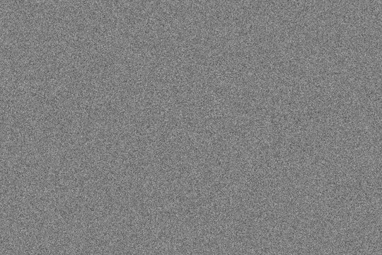 Fototapeta Szare ziarniste tło przypominające telewizyjny szum – tekstura w stylu retro, idealna do projektów graficznych i efektów specjalnych.