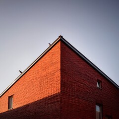 Triangular Roof Silhouette In Golden Light