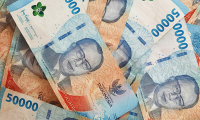 New IDR Indonesian Rupiah the official currency of Indonesia in 2022. Business Loan Income Money Investment Economy and Money concept. 50.000 Rupiah bank notes