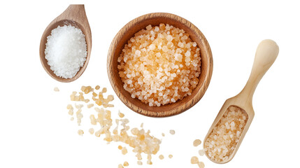 A top view of wooden spoons and a bowl filled with bath salts on a white surface backdrop