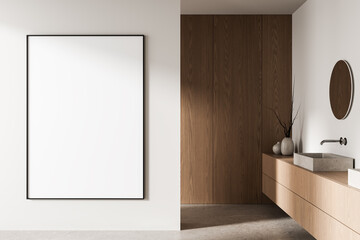 Minimalist bathroom interior with blank poster mockup on white wall next to modern wooden cabinets and concrete sink, stylish home decor concept. 3D Rendering