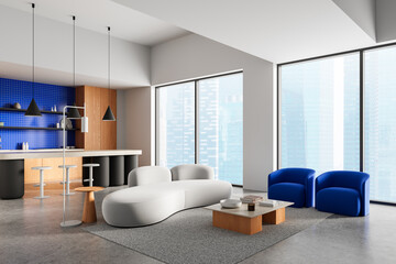 Modern minimalist living room with white sofa, blue armchairs, and contemporary kitchen with blue tile backsplash and large city view windows. 3D Rendering. 3D Rendering