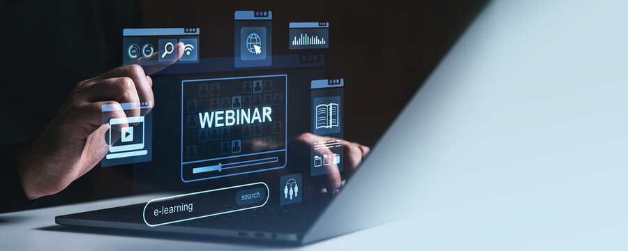 Webinar and e-learning concept with digital education icons on futuristic laptop screen.