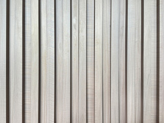 Natural light grey oak wood fluted panel or fluted strips, rustic wood, seamless texture. © TMR Studio