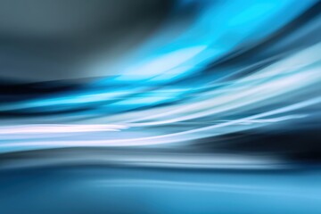 Dynamic blue abstract light streaks motion.