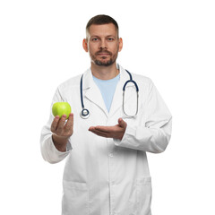 Nutritionist with green apple and stethoscope on white background