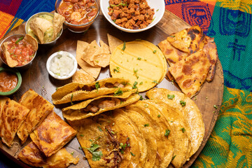 A Delicious Mexican Cuisine Platter that includes Tacos and Salsas for everyone to enjoy