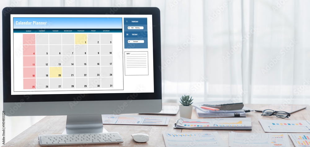Poster calendar on computer software application for brisk schedule planning for personal organizer and onl