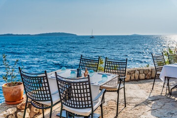 table and chairs on the beach of Adriatic Sea