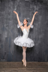 Naklejka premium Studio portrait of a ballerina in a white tutu