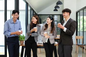 Businessmen drinking hot coffee and having a pleasant business conversation.