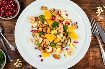 Appetizing seafood, salad.