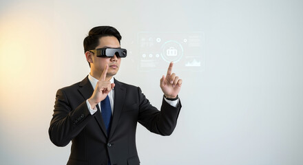 Asian man in suit using augmented reality glasses, hands raised, virtual interface on white background. Technology, innovation, business, education, sale, service, horizontal banner