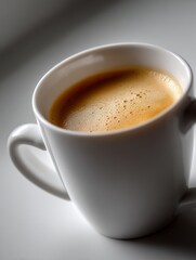 Obraz premium Freshly Brewed Espresso Coffee In White Cup, Breakfast Beverage Close Up