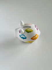 Piggy bank on a white background. Place for the inscription