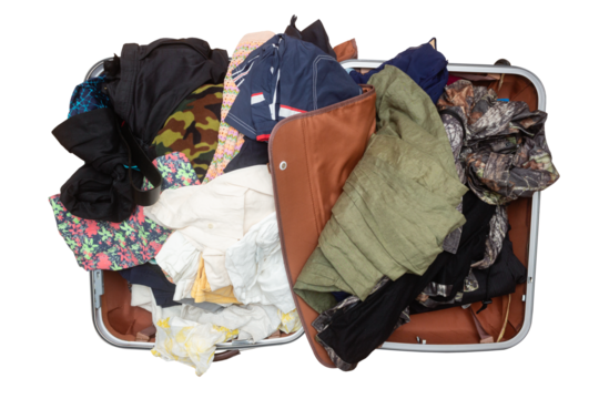 Open suitcase with belongings and clothes isolated on white background. Top view