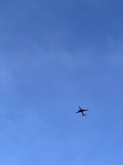 Airplane in the blue sky