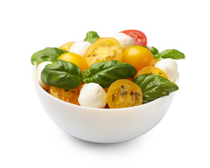 Fresh salad with yellow tomatoes, basil and mozzarella cheese in bowl isolated on white