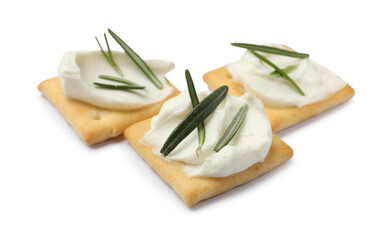 Tasty crackers with cream cheese and rosemary isolated on white