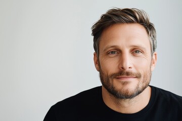 Obraz premium Detailed closeup portrait of a confident handsome man with a thumbs up gesture on a pristine white background