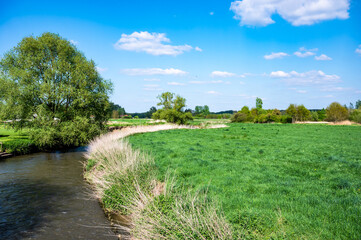 Green surroundings in the bending river Dyle in Korbeek-Dijle, Flemish Brabant, Belgium