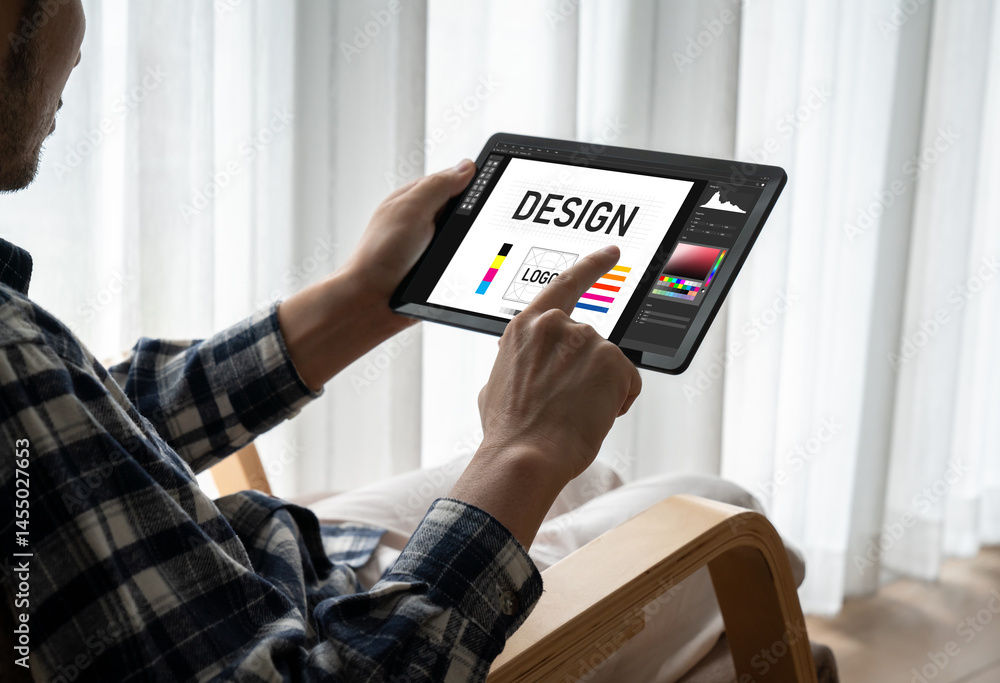 Poster graphic designer software for modern design of web page and commercial ads showing on the computer s