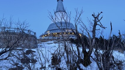 Futuristic mountain tower Jested in Liberec. Twilight view
